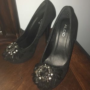 Black suede almond toe pumps